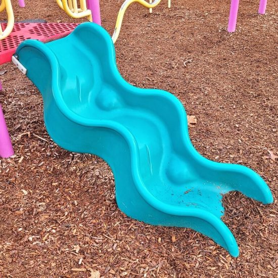 Windy mini slide at Kerrisdale Centennial Park playground