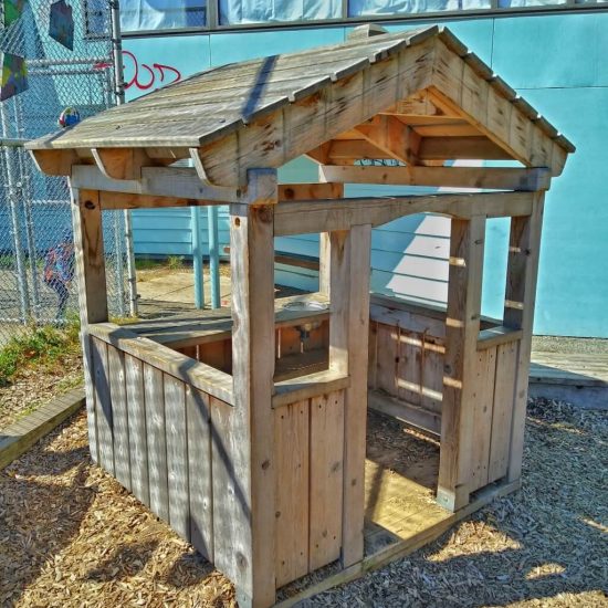 Playhouse at Mount Pleasant Family Centre playground