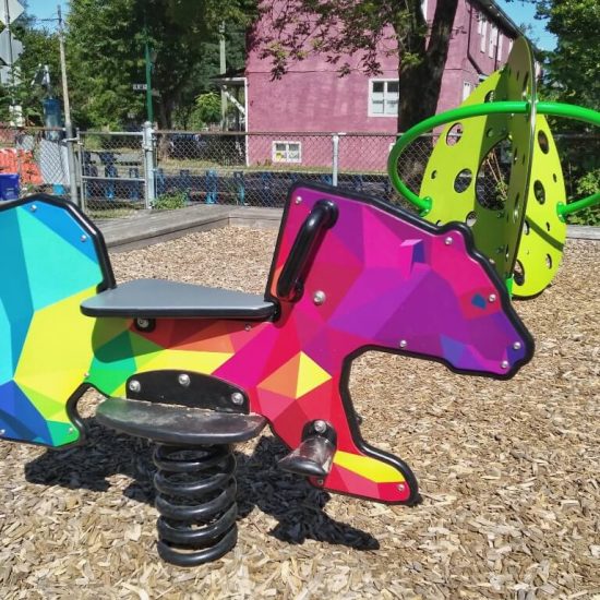 Spring rider and climber at Mount Pleasant Family Centre playground