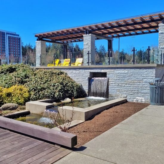 Pergola with lounge chairs at Mundell park