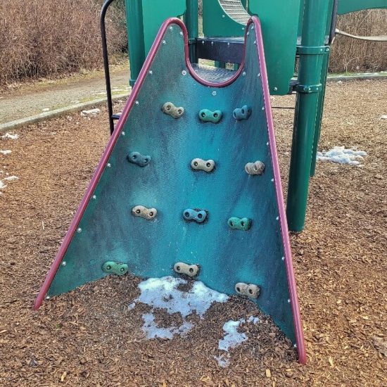 Climbing wall at Oak Meadows park playground