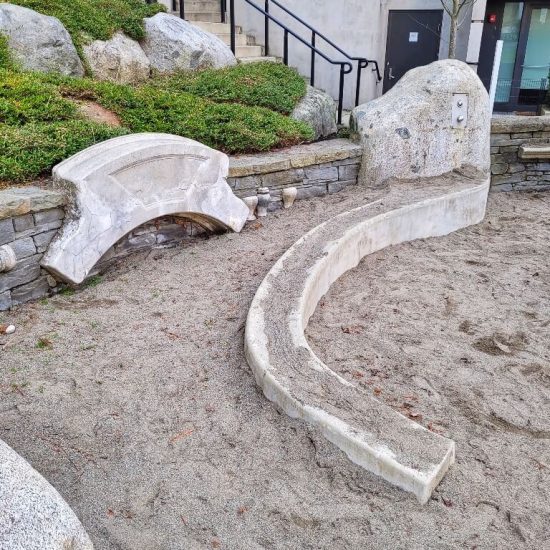 Sand area with water at Shannon Mews Park playground