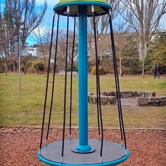Topsy turny spinner at Tisdall Park playground